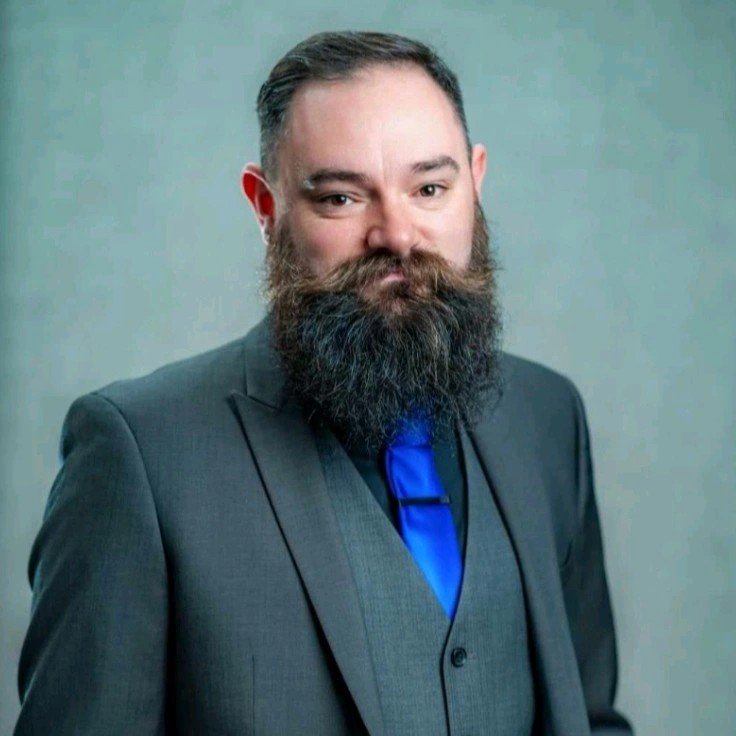Portrait of Alex Sheehan, MSc, MHA, eMBA, MA, MPA